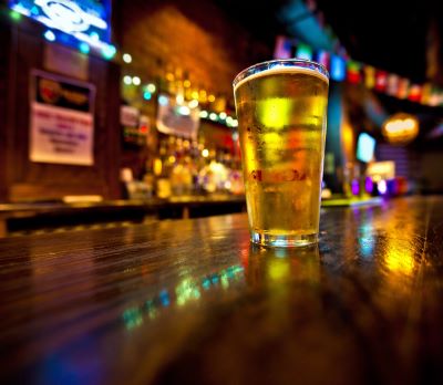 Pint of beer on a bar Pint of beer on a bar