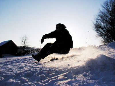 Silhouetted Snowboarder