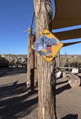 Do Not Feed Dinosaurs Sign