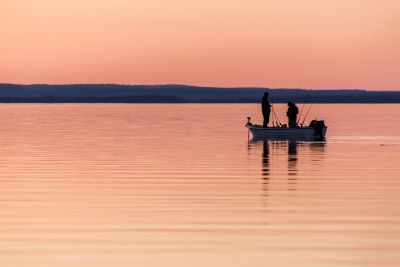 Small Fishing Boat on Lake