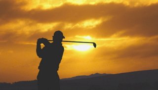 Golfer at Sunset