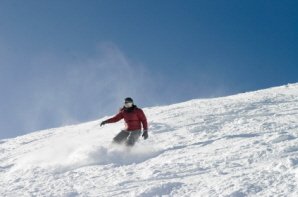 Snowboarder in powder